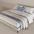 Modern Double Bed with Upholstered Headboard White Sheets Blue Beige Striped Blanket and Pillows