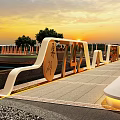 Modern Garden Landscape Front Of Contemporary Building With Square Green Lawns And Circular Design Lighting