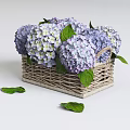 Elegant Purple Hydrangeas Displayed In Handwoven Wicker Basket With Green Leaves Scattered Around