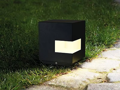 Modern Black Cube Shaped Outdoor Light Illuminating Garden Grass And Stone Path 3d model