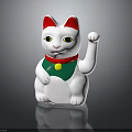 White Lucky Cat Figurine With Red Ears Green Collar Yellow Accent And Raised Paw