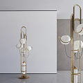 Modern Gold Metal Frame Floor Lamp With Multiple White Lampshades In Minimalist Interior