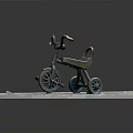 Children's Tricycle Displayed On Gray Brick Platform Against Gray Background