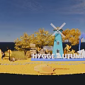 Hygge Autumn Themed Photo Spot With Blue Windmill Yellow Trees Small House And Arch