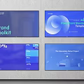 Multiple TVs Displaying Brand Toolkit PowerPoint Template Data and AI Content