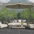 Modern Outdoor Sofa Set with Umbrella Green Plants and Coffee Table on Patio