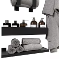 Organized Bathroom Essentials Collection With Soft Towels Bathrobe Toiletries And Storage Shelves