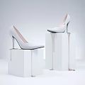 White High Heels Showcased On White Pedestals With Dripping Design Details