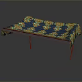 Elegant Table Featuring Blue Tablecloth With Yellow Green Patterns And Metal Legs