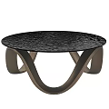 Modern Round Coffee Table With Black Textured Tabletop And Curved Wooden Legs