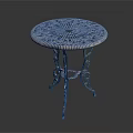 Round Blue Side Table With Intricate Carved Lace Design And Metal Legs