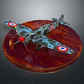 Camouflage Airplane Model With Red Propeller On Wooden Base And Wing Insignia