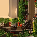 Parking Lot Aerial View With Vehicles Trees and Nearby Building
