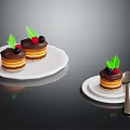 Delicious Mini Cakes With Chocolate Topping Fresh Berries And Green Leaves On White Plates