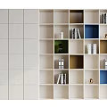 Modern White Frame Bookcase With Multi Compartment Colorful Cubbies Holding Books And Decorative Items