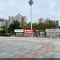 Vibrant Commercial Street With Retail Shops Plaza And High Rise Buildings