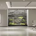 Modern Open Office Interior With Stone Wall Green Plants Water Feature Desk And Office Chairs