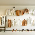 Stylish Clothes Hangers With White Beige Brown Garments And Shoes