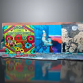Vibrant Collage Art Installation With Stop Capitalism Sign Flower Patterns Blue Scene And Graffiti
