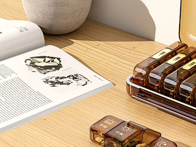 Stylish Decorative Ornament Set with Open Book Ceramic Vase and Transparent Storage Case on Wooden Table 3d model