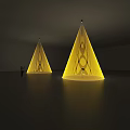 Brightly Lit Yellow Conical Decorative Lights in Dark Room with Person Pointing