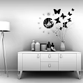Modern White Entryway Console Table With Drawers Decorative Vase Floor Lamp And Butterfly Wall Clock