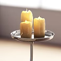 Candle Lamp With Three Lit Candles On Wooden Table Near Open Book In Cozy Setting