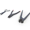 Black Hand Tools Including Scissors And Different Pliers For Workshop Or DIY Use