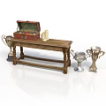 Rustic Wooden Table Display With Open Red Chest And Shiny Silver Trophies