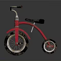 Vintage Red Tricycle With Black Seat Silver Handlebars Three Wheels And Metal Frame
