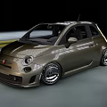 Olive Green Sporty Small Car With Custom Alloy Wheels In Motion