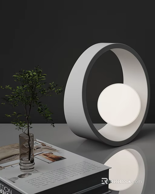 Modern Circular Design Table Lamp with White Light Source and Green Plant on Smooth Surface 3d model 