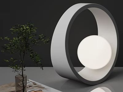 Modern Circular Design Table Lamp with White Light Source and Green Plant on Smooth Surface 3d model