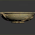 Broken Bowl Sculpture With Cracked Design And Beige Blue Brown Decorative Patterns