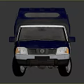 Blue And White Police Pickup Truck With Enclosed Cargo Cab And Emblem
