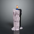Burning Black And White Candle With Dripping Wax And Blue Yellow Flame