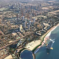 Aerial View Planning of Modern Coastal City with Skyscrapers Beachfront and Iconic Architecture