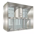 Modern Building Entrance Featuring Revolving Door With Metal Frame And Glass Panels