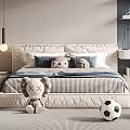 Cozy Double Bed With Blue Pillows Striped Bedspread Stuffed Toys Soccer Ball And Basketball
