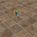 Brown Stone Floor Tiles In Checkerboard Layout With Green Flower Vase