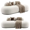Soft Beige Fabric Two Seater Sofa With Plush Pillows And Knitted Blanket