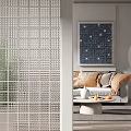 Modern Grid Pattern Room Divider Separating Living Space With Sofa Pillows And Wall Art