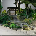 Traditional Japanese Garden With Wooden Pavilion Stone Steps Lush Greenery And Trees