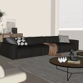 Modern Leather Sofa And Glass Coffee Table Set With Decorative Pillows And Tabletop Ornaments