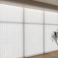 White Window Blinds For Large Window With Two Potted Plants And Wooden Floor