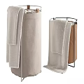 Two Different Colored Fabric Laundry Baskets With Towels And Metal Frames