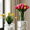 Yellow and Pink Tulips in Glass Vases on Marble Pedestals by Window with Snowy Trees