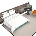 Modern Double Bed With White Bedding Wooden Headboard Side Table And Orange Chair
