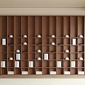 Modern Wooden Bookcase With Multiple Shelves Holding Books And Decorative White Items