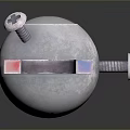 Metal Sphere With Horseshoe Magnets And Red Poles On Reflective Surface